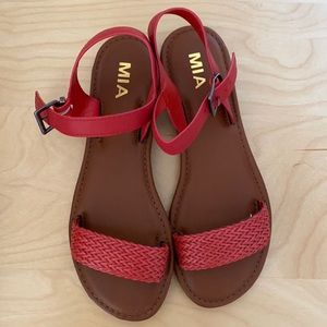 Red sandals.